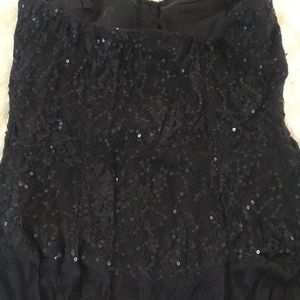 Black glitter blouse.